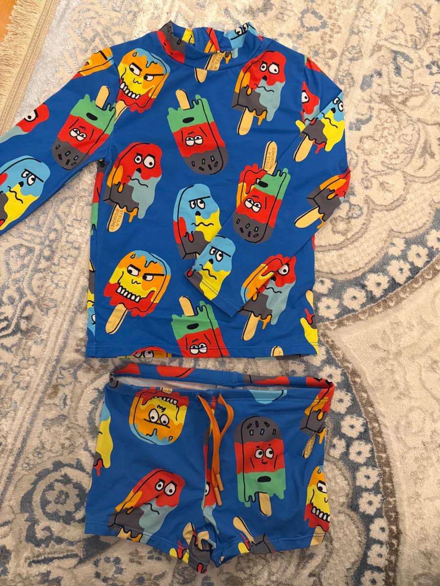Stella McCartney rash guard and swimming shorts