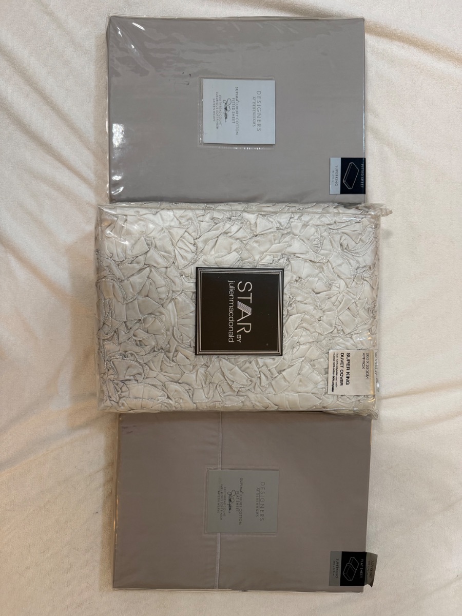 Brand new bed sheets and duvet