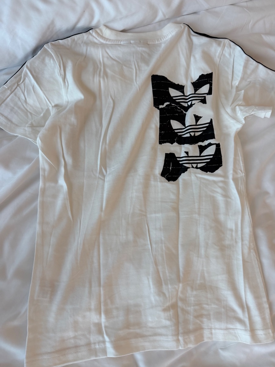 Adidas Originals white t-shirt with black stripes and pocket design photo 2