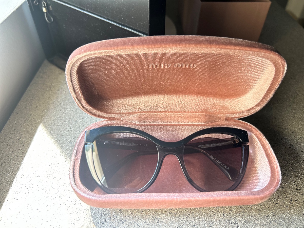 Miu Miu black sunglasses photo 2