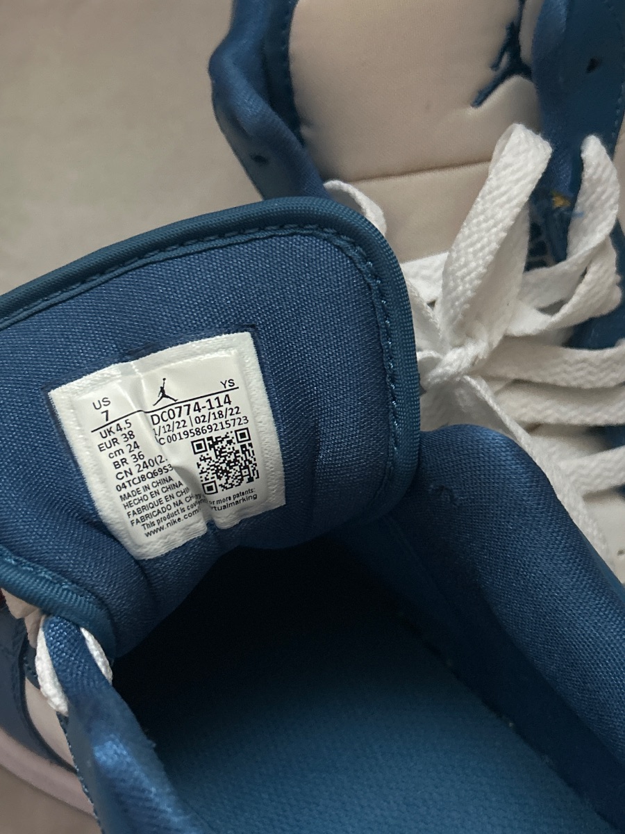 WHITE & BLUE NIKE LOW JORDANS photo 3