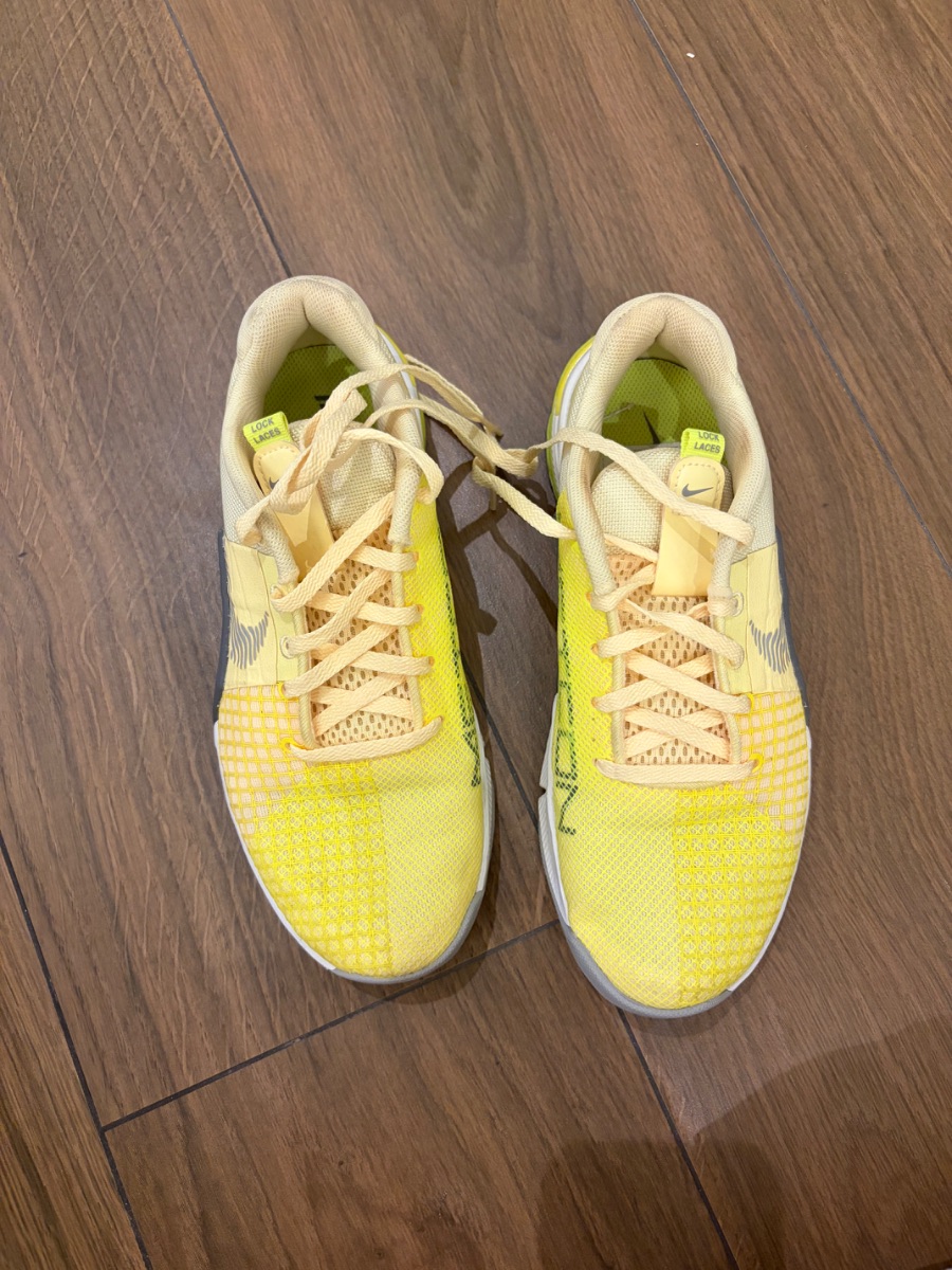 Nike yellow trainers