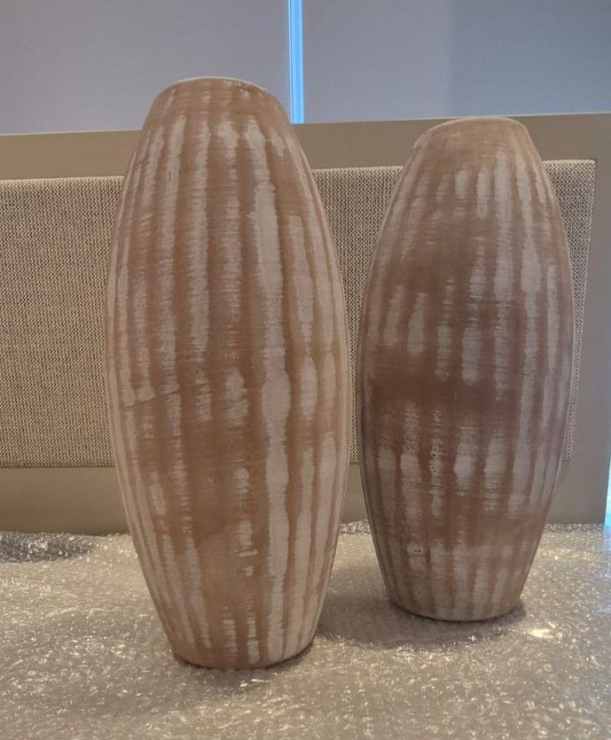 OMA Living Mud Vases.