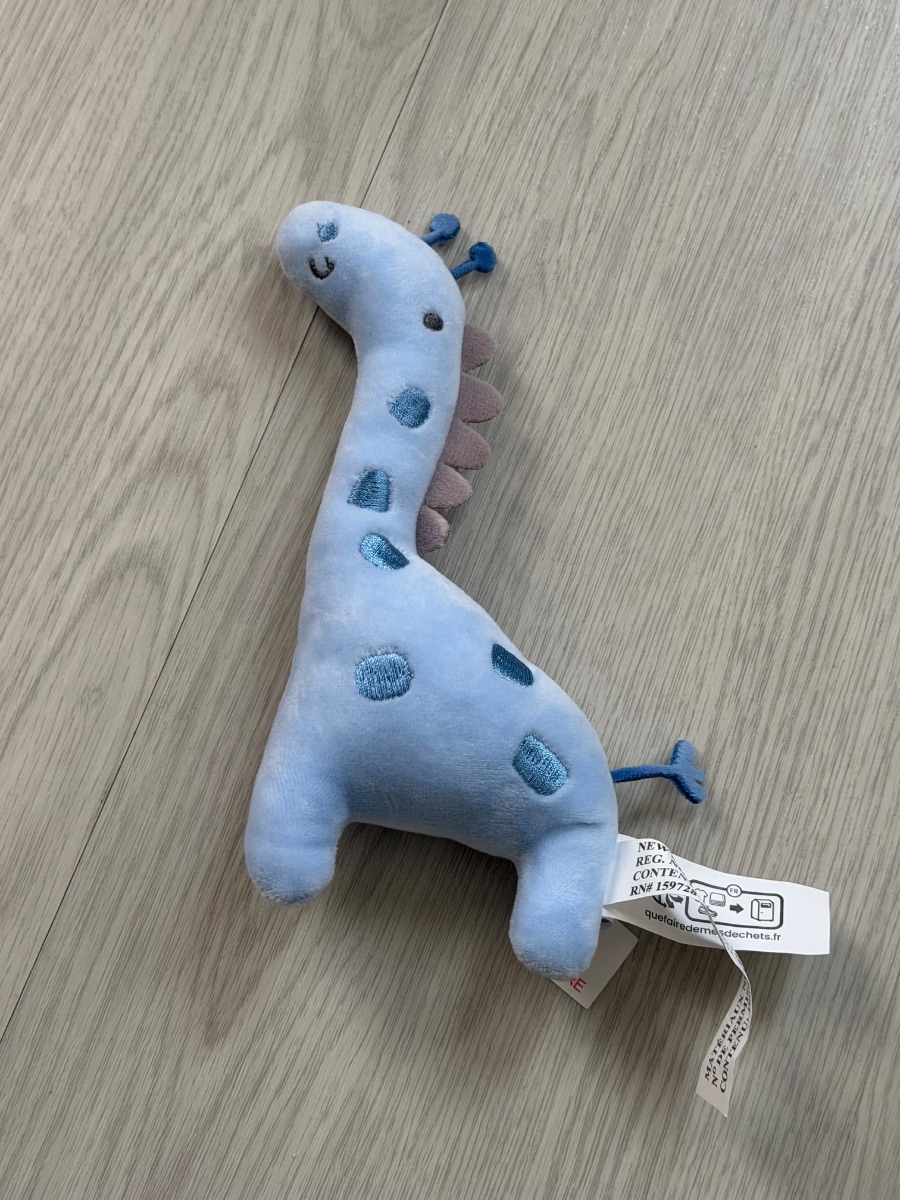 Blue dinosaur plushie toy