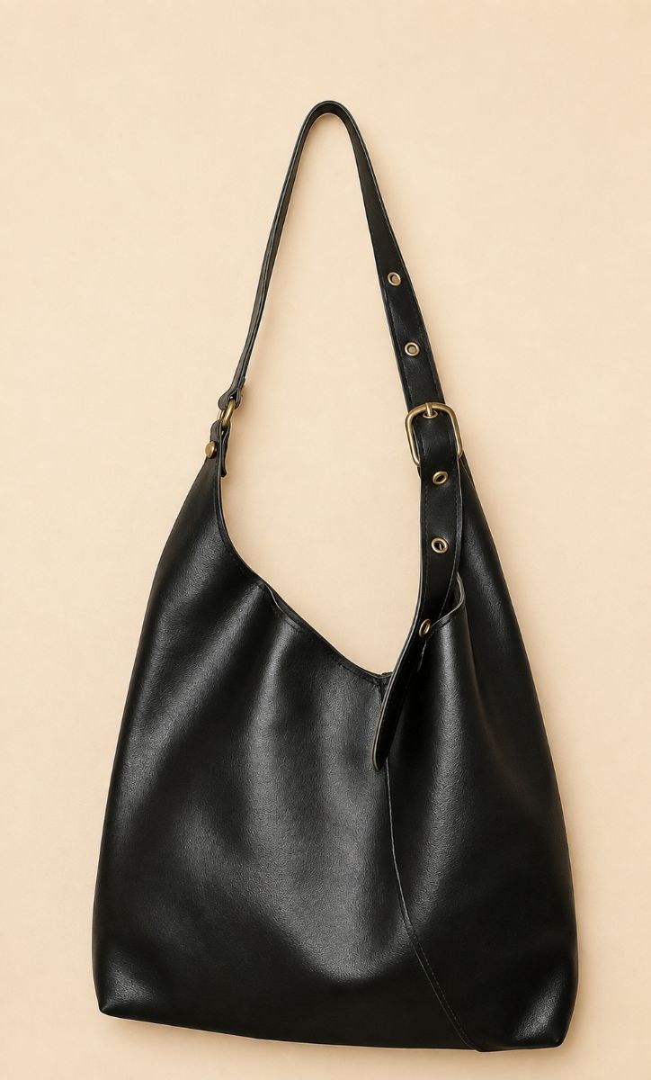 Black leather sling / tote bag with adjustable straps