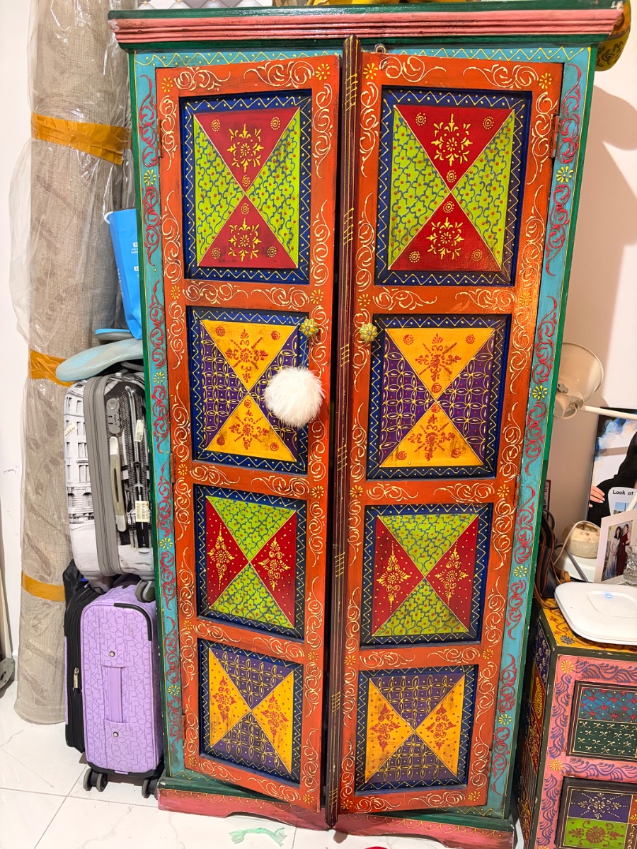 Tall handmade cupboard with shelves