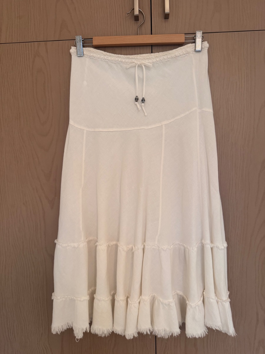 White tiered maxi skirt with frayed hem beach style