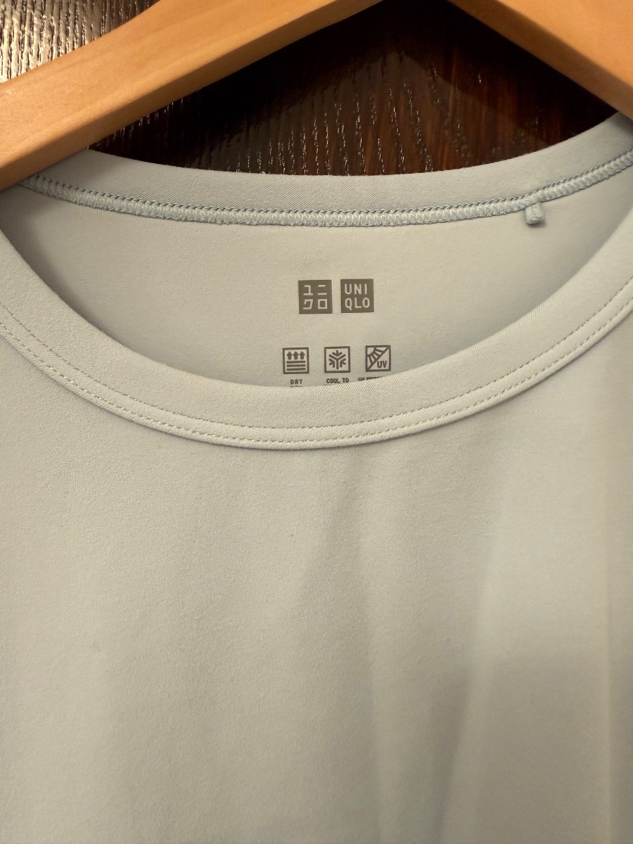 Uniqlo baby blue sport top photo 2