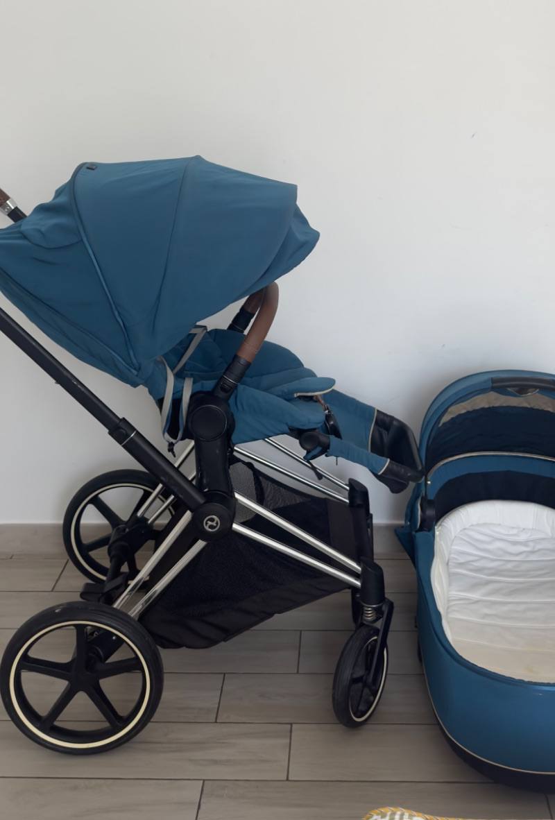 A Cybex stroller with bassinet, listed on Loop